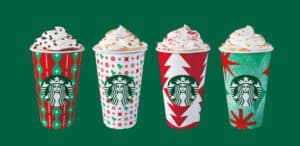 Starbucks featured 2022 cups with red, white and green designs featuring stars and Christmas trees.